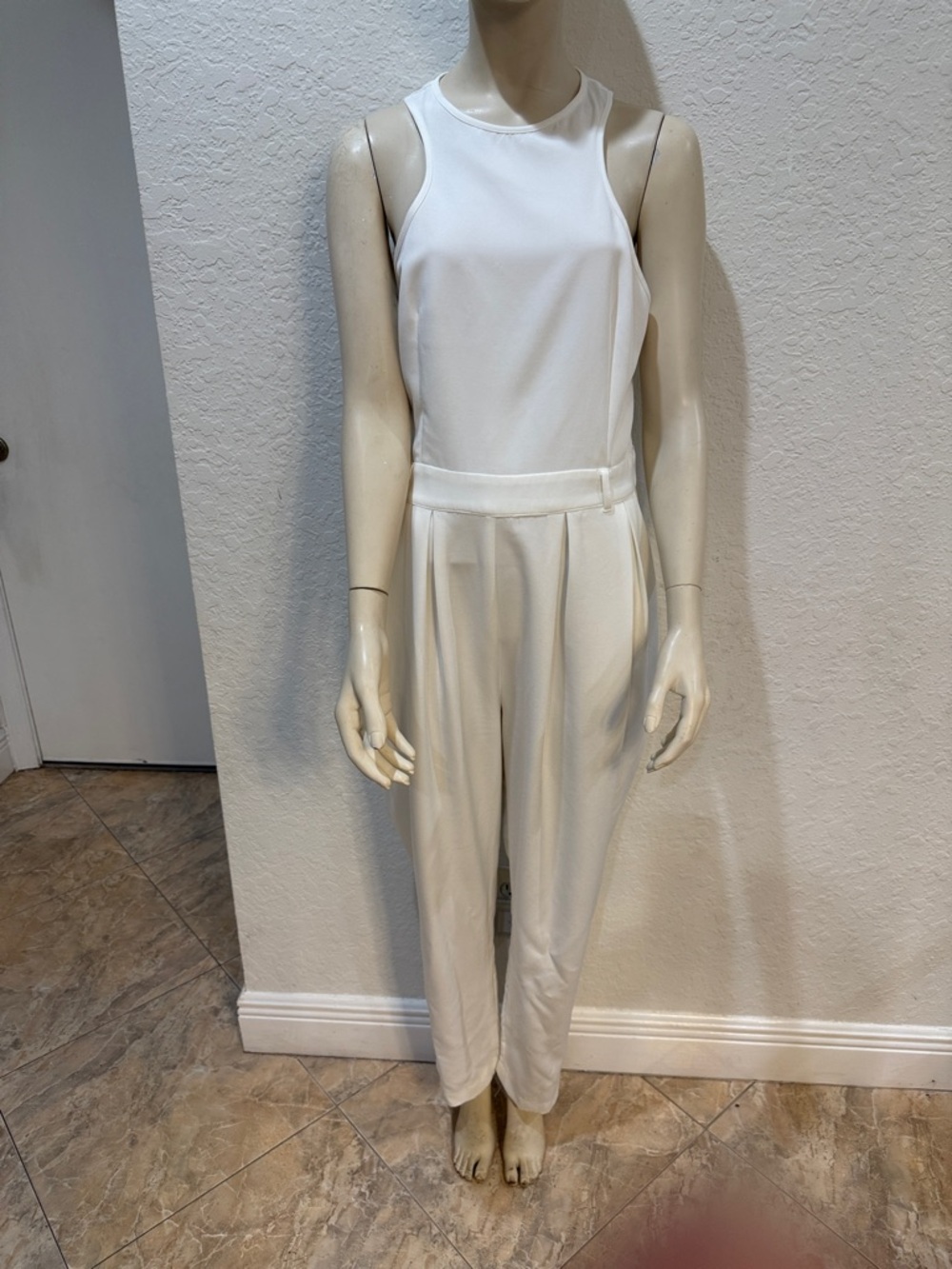 PrettyLittleThing Sleeveless Cream High-Neck Jumpsuit
